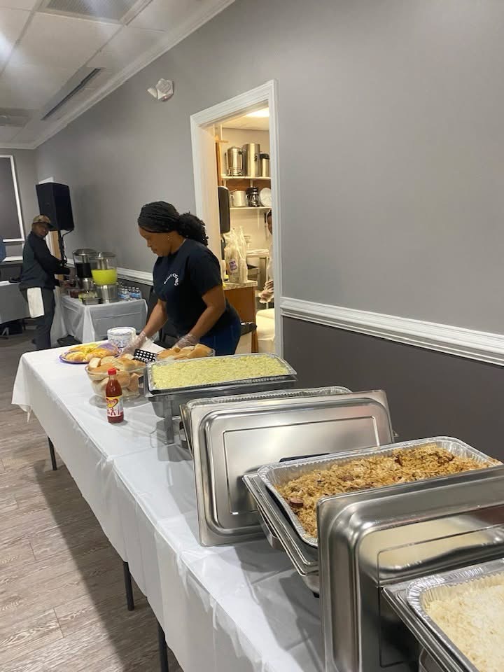 Bossy Hog staff preparing a buffet service