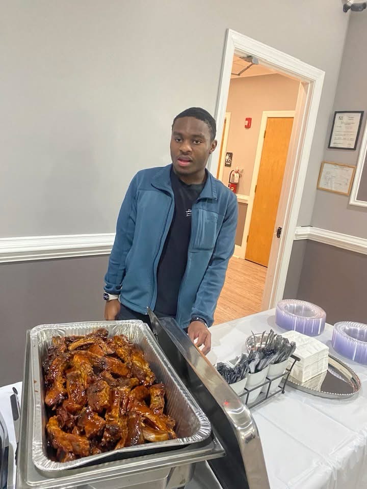 A full catering tray of glazed wings