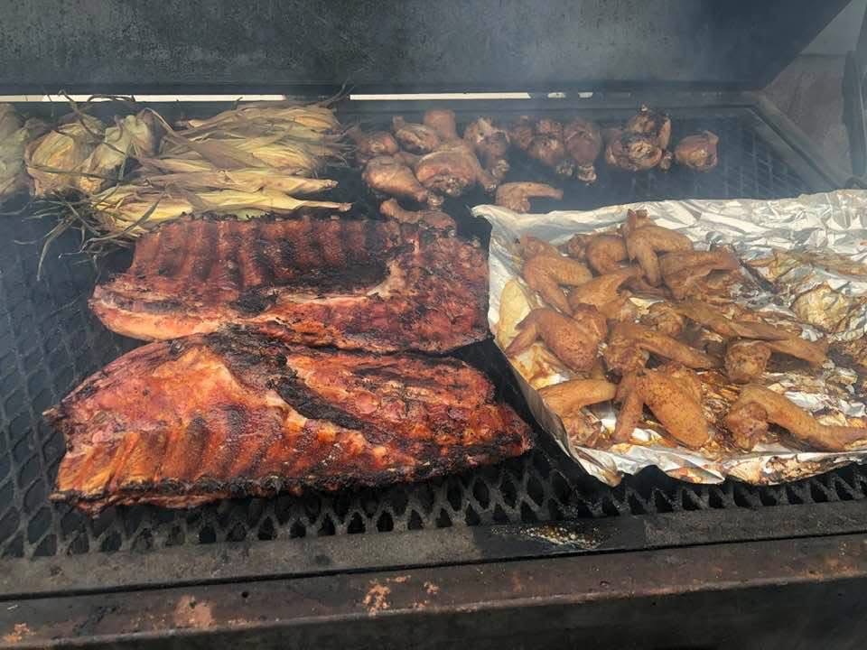 Ribs, chicken, wings, and corn on the smoker